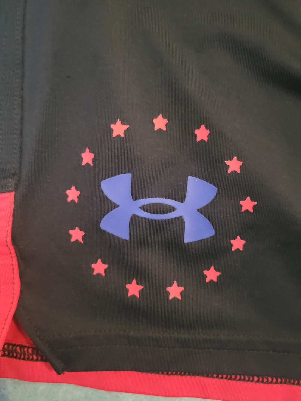Under Armour Men’s Black Shorts with Red Hem and Blue Flag - Picture 3 of 5